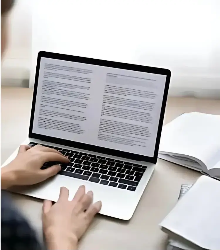 Content Writing 1 Writer writing content on laptop